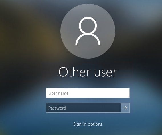 The Windows 10 login screen, showing both username and password inputs